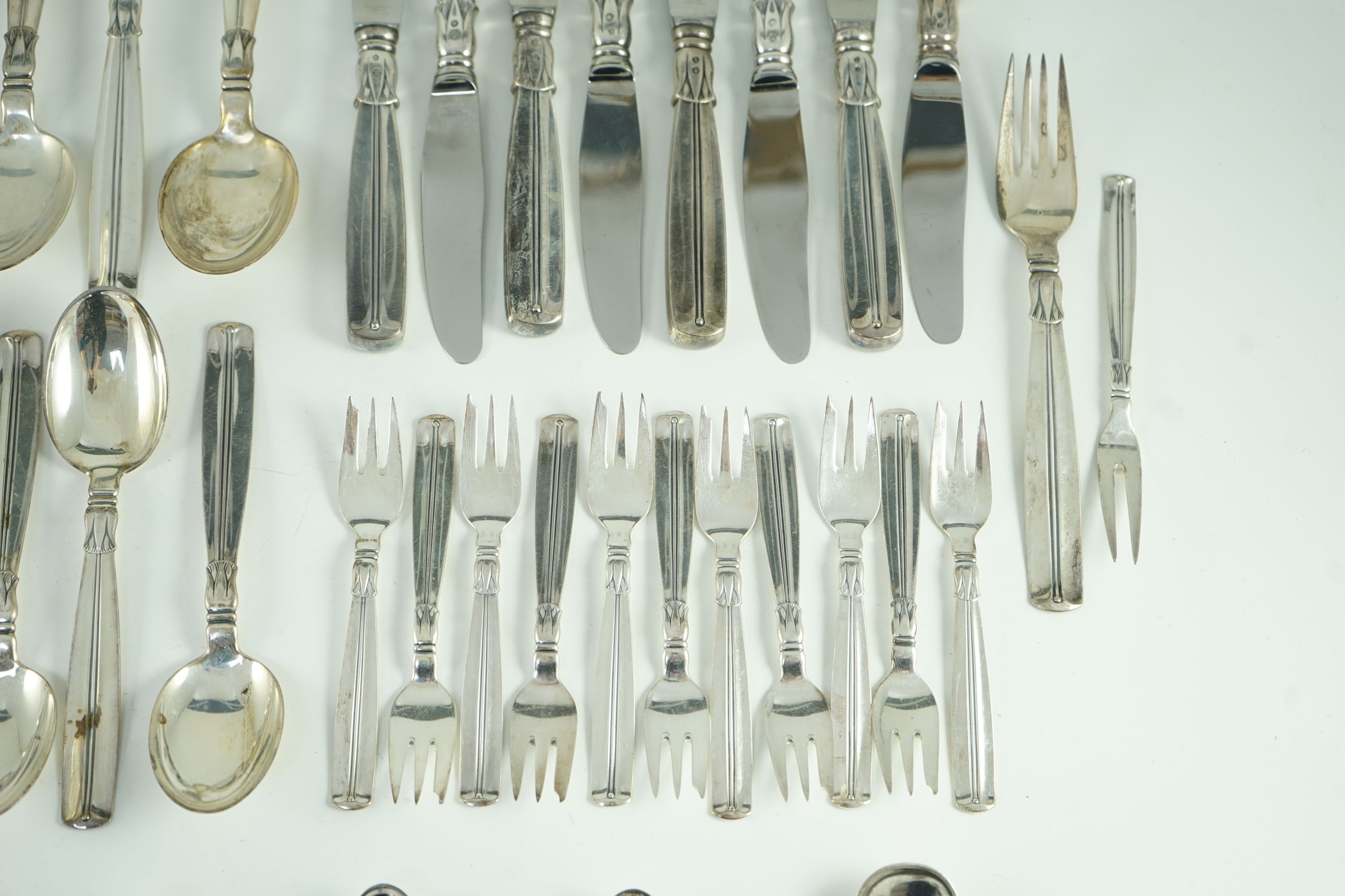 A mid 20th century harlequin part canteen of Danish 830 standard flatware by Broderne, W & S Sorensen